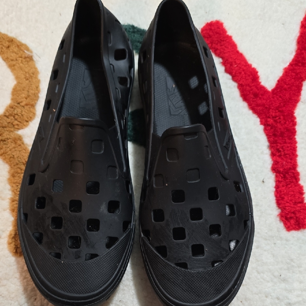 Vans Black Perforated Slip-Ons